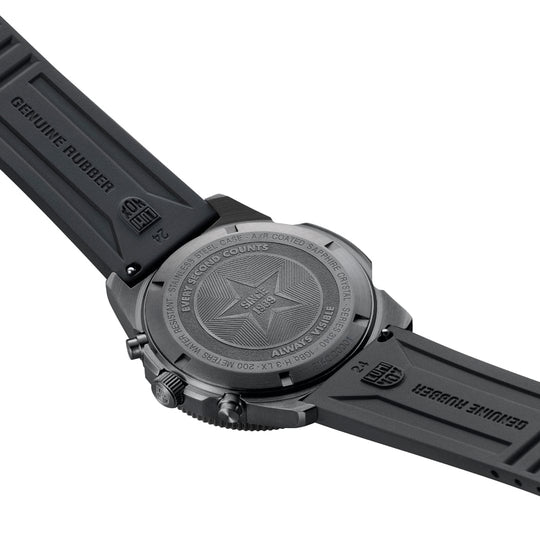 Black wristwatch with a star emblem on its back case.