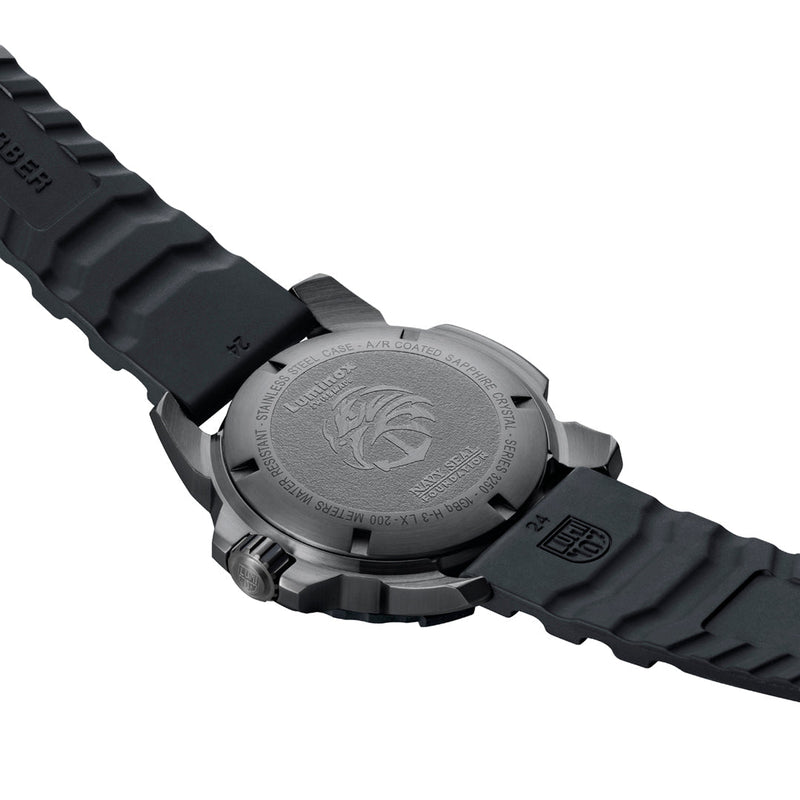 Black wristwatch with a rugged design and engraved caseback.