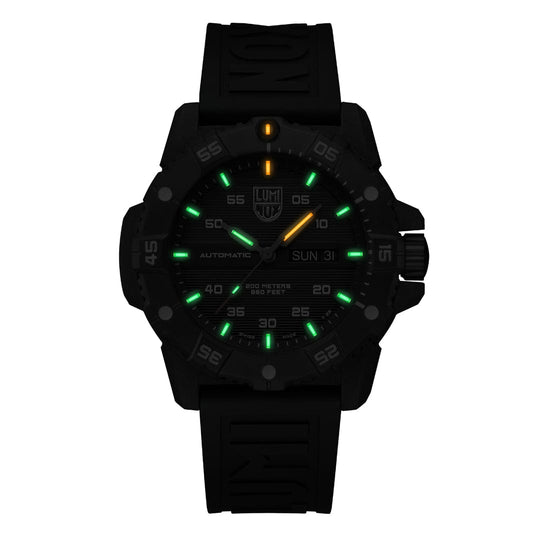 Black tactical wristwatch with luminous green and yellow markings on the dial.