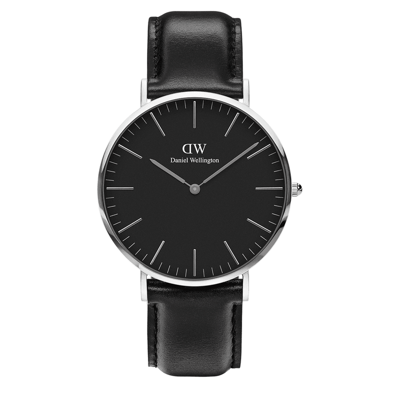 Sleek black and silver wristwatch with a leather strap.