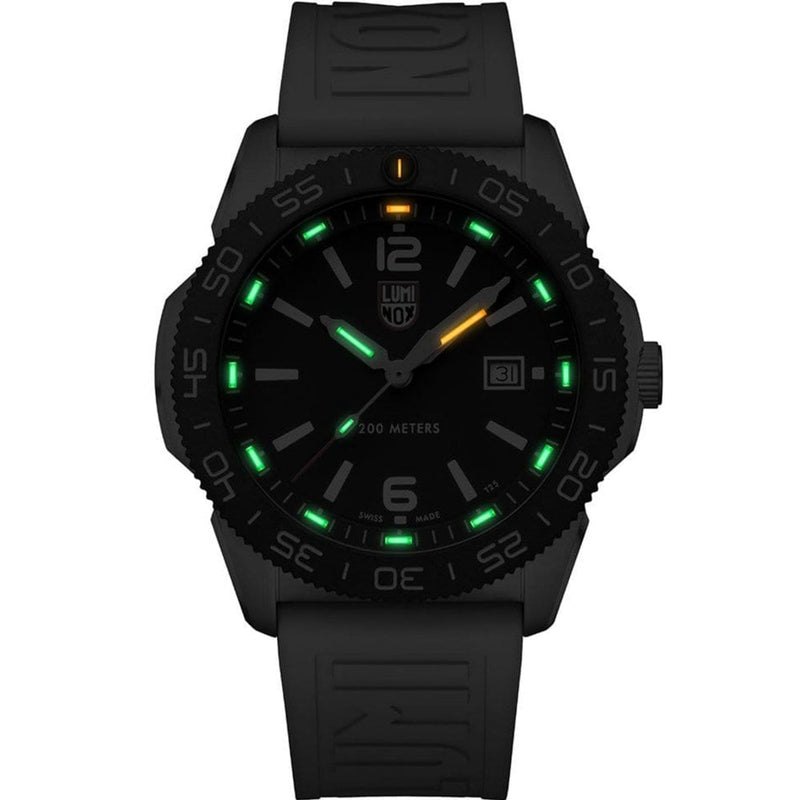 Black sports watch with luminous markings on the dial and a rubber strap.